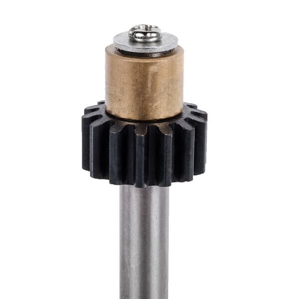 A metal gear with a black and gold pin with a metal and black gear.