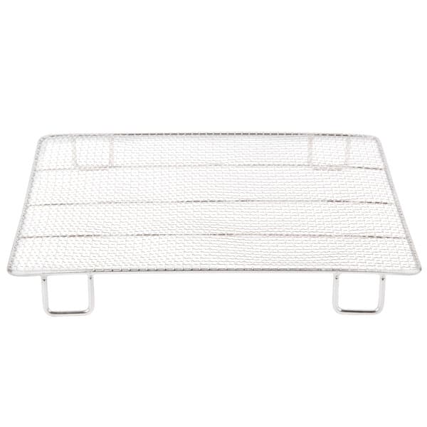 A metal rack with a white grid.