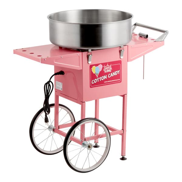 A pink cotton candy machine with a large stainless steel bowl and a wheeled cart.