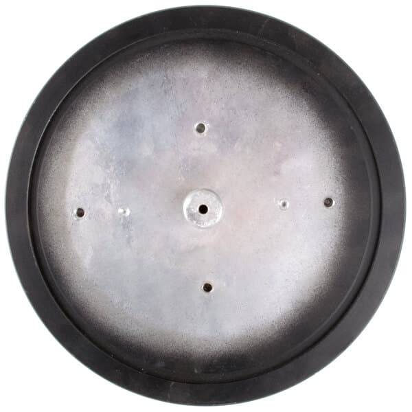 A black and silver circular grid with holes.