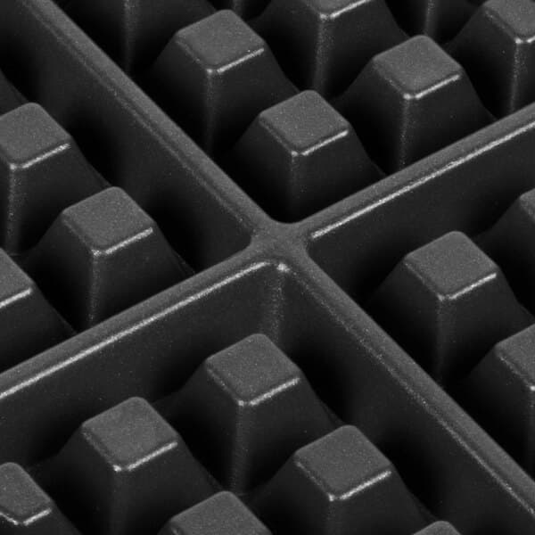 A black plastic Carnival King waffle grid.