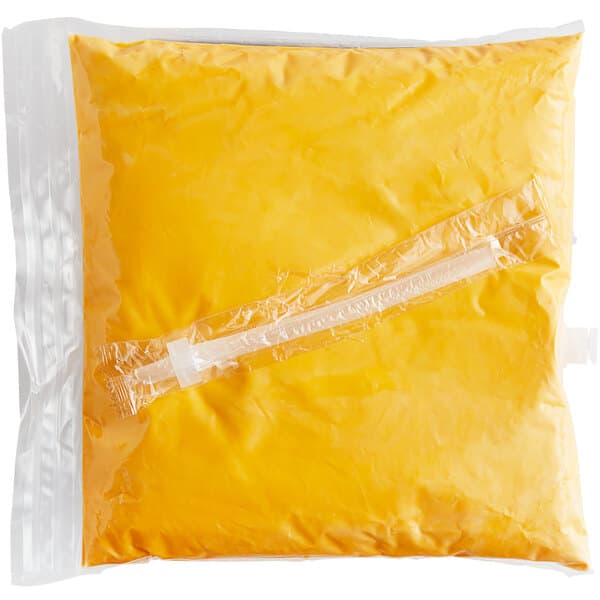 A white plastic bag of yellow Carnival King cheddar cheese sauce.
