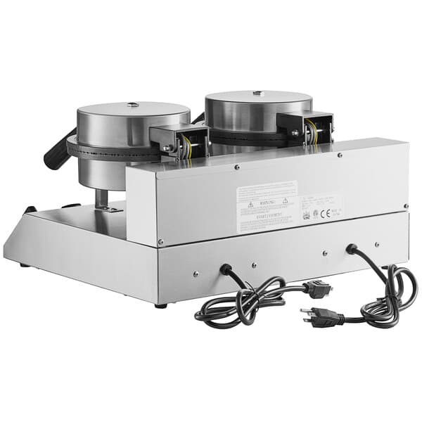 A Carnival King double waffle cone maker with two round metal containers.