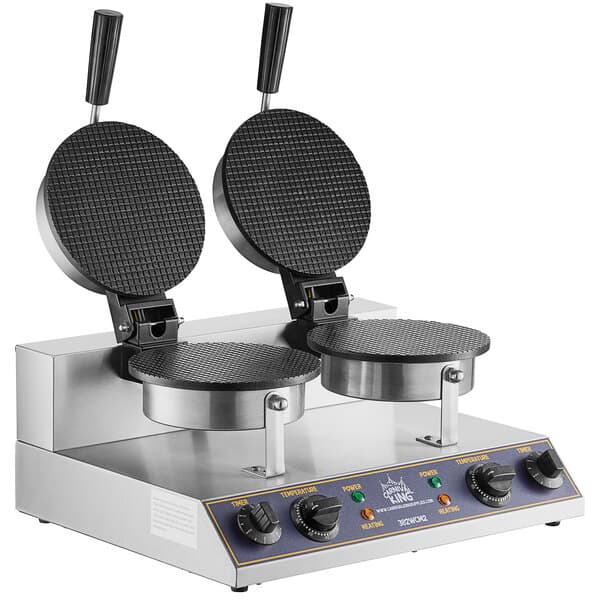 A Carnival King double waffle cone maker with two round waffles.