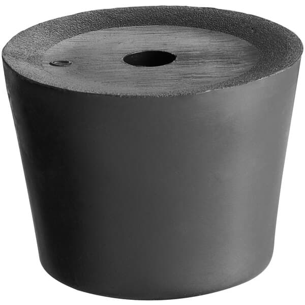 A black rubber foot with a hole in it.