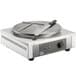 A Carnival King crepe maker with a knife on a circular surface.