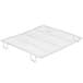 A white metal tray with a wire mesh grate.