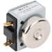 A small metal device with a round metal disc, the Carnival King 5 minute dial timer.
