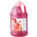 A jug of Carnival King Fruit Punch Slushy Syrup with a red lid.