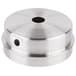A silver round metal lid with a hole in the center.