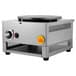 A silver square Carnival King liquid propane crepe maker with a round metal surface.