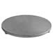 A grey round metal hot plate.