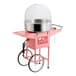 A pink cotton candy machine with a stainless steel bowl, clear dome cover, and wheeled cart.