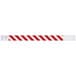A white background with a red and white striped wristband.