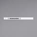 A white rectangular Carnival King wristband with black text reading "DESIGNATED DRIVER"