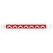 A white Carnival King wristband with red chevron patterns.