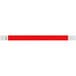 A red wristband with white stripes.