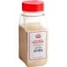 A plastic container of Carnival King Savory Garlic Popcorn Seasoning with a red lid.