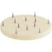 A white circular plate with spikes on it.