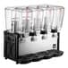 A quadruple 5-gallon bowl refrigerated beverage dispenser with four clear containers and individual spouts.