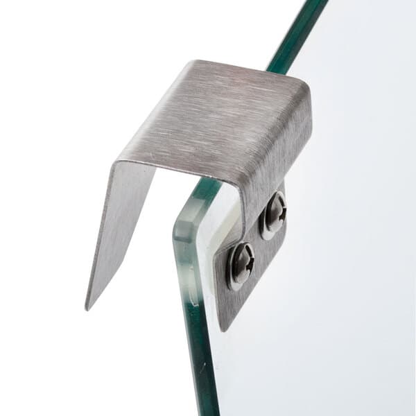 A metal bracket on a glass door with a Carnival King logo on the glass.