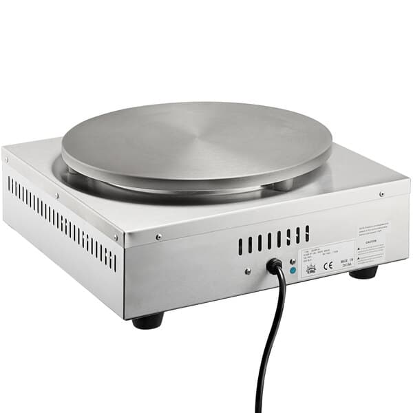 A silver metal plate with a black cord.