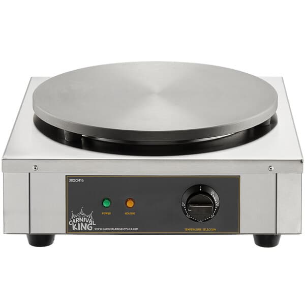 A Carnival King steel crepe maker with a lid.
