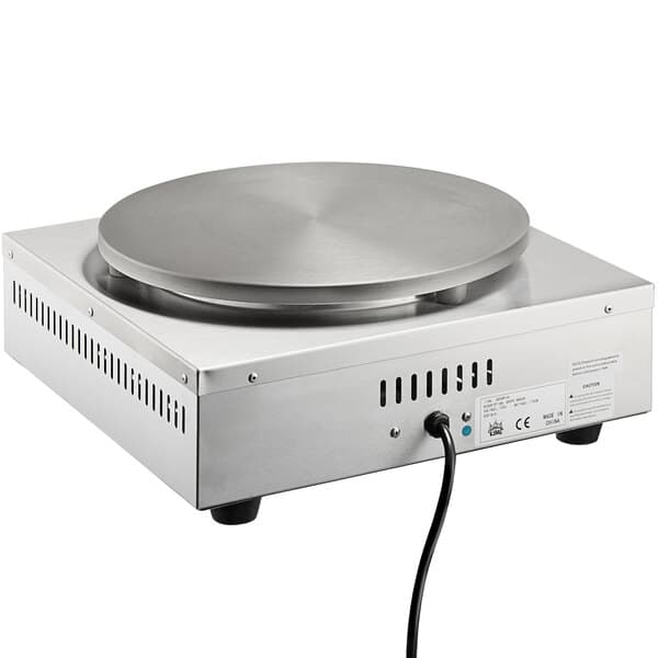 A close-up of the metal plate on a Carnival King 16" Crepe Maker.