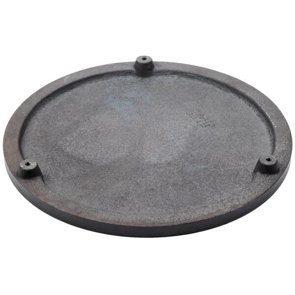 A round metal hot plate with holes.