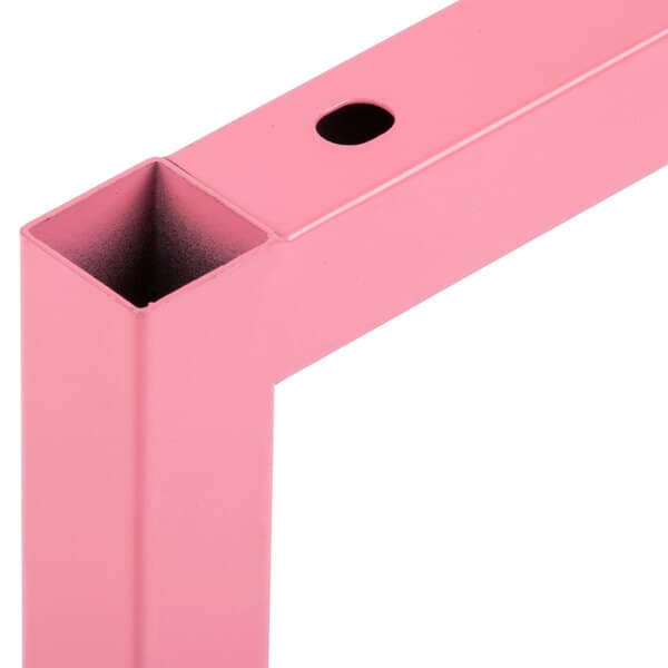 A pink metal Carnival King wheel frame corner with holes.