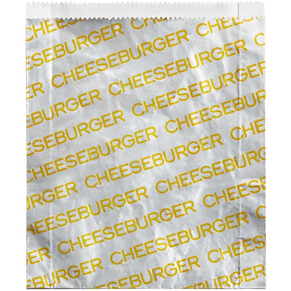 A white paper bag with yellow and white text that reads "Large cheeseburger" and "Carnival King"