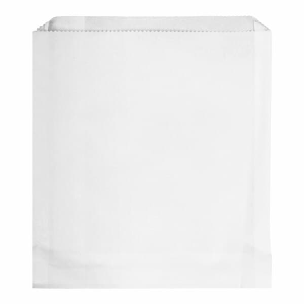 A white rectangular Carnival King sandwich and extra large French fry bag.