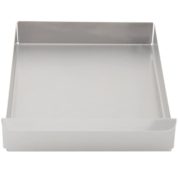 A silver rectangular metal tray with a handle.