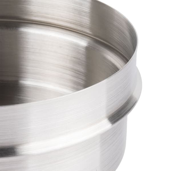 A stainless steel lid on a Carnival King sauce pump container.