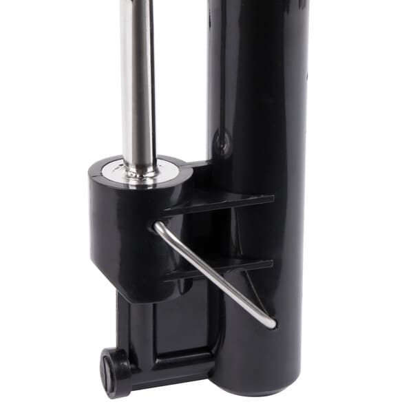 A black and silver Carnival King sauce pump with a handle on it.