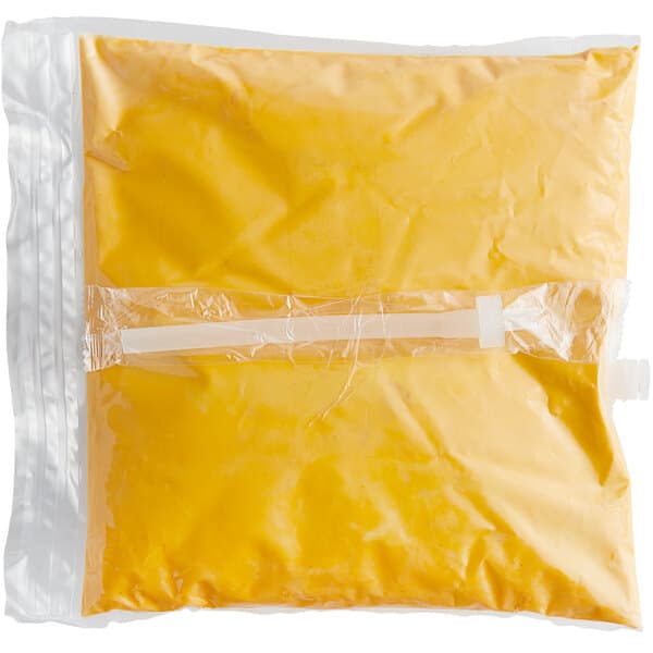 A plastic bag of yellow liquid with a yellow and white patterned label.