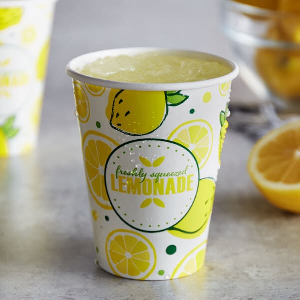 A Carnival King lemonade paper cup with lemons on it.