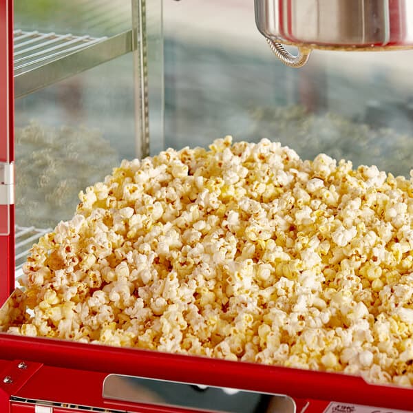 a red container full of popcorn