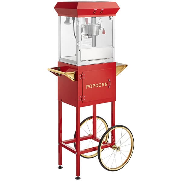 A red Carnival King popcorn machine on a cart.