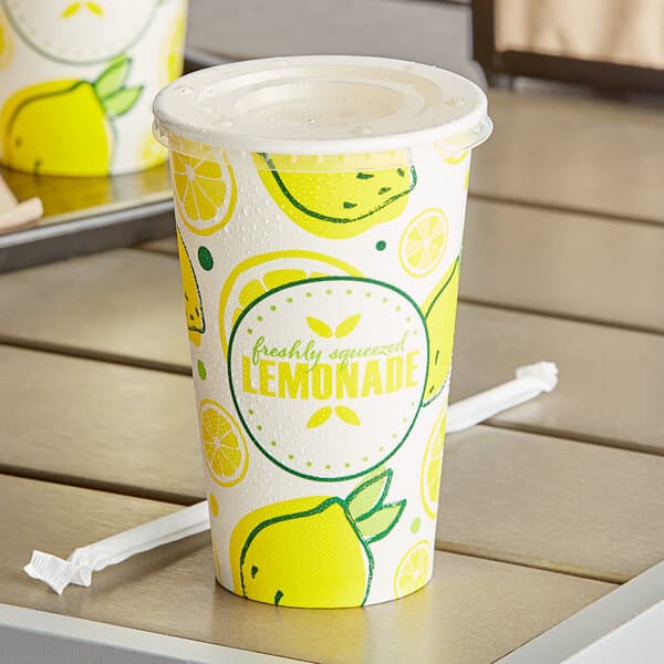 A Carnival King paper lemonade cup with lemons on it.