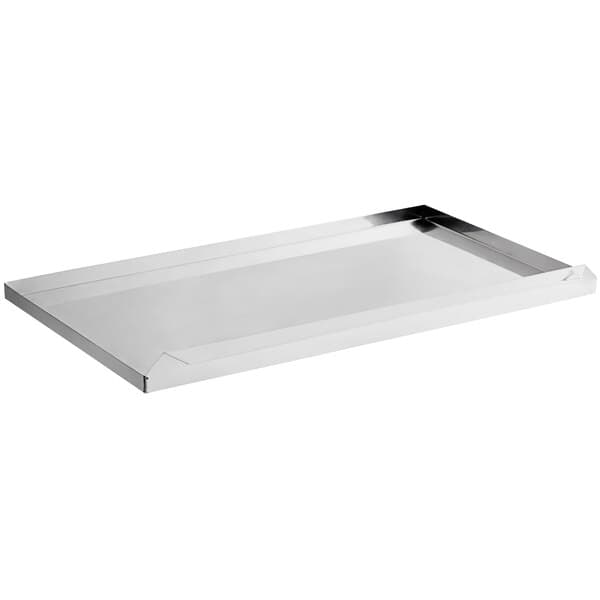 A white rectangular glass sneeze guard with a silver handle.