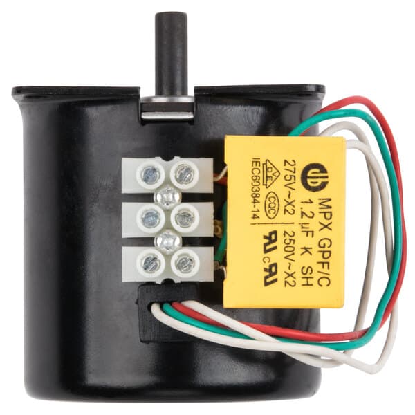 A black Carnival King motor with wires and a yellow label.