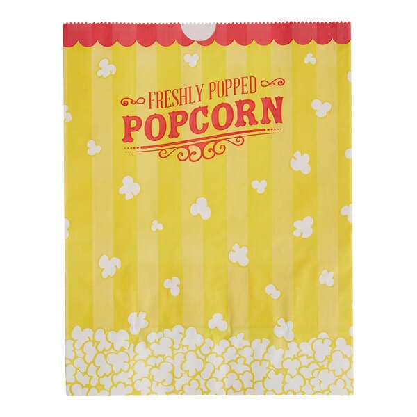 A yellow Carnival King popcorn bag with red and white stripes and a picture of popcorn on it.