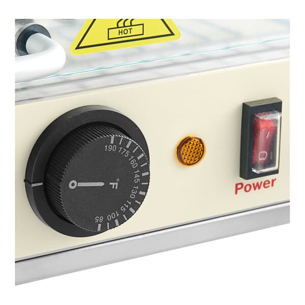 The power switch and control panel on a Carnival King countertop hot food display case.