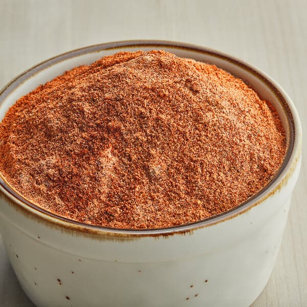 A bowl of Carnival King Chipotle Popcorn Seasoning.